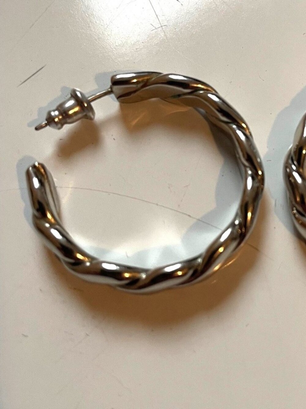 Braided silver hoop earrings, EUC.
